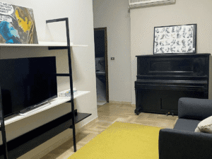 Soggiorno back Piano Apartment