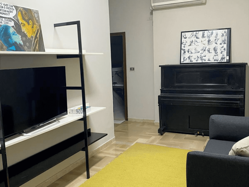 Soggiorno back Piano Apartment